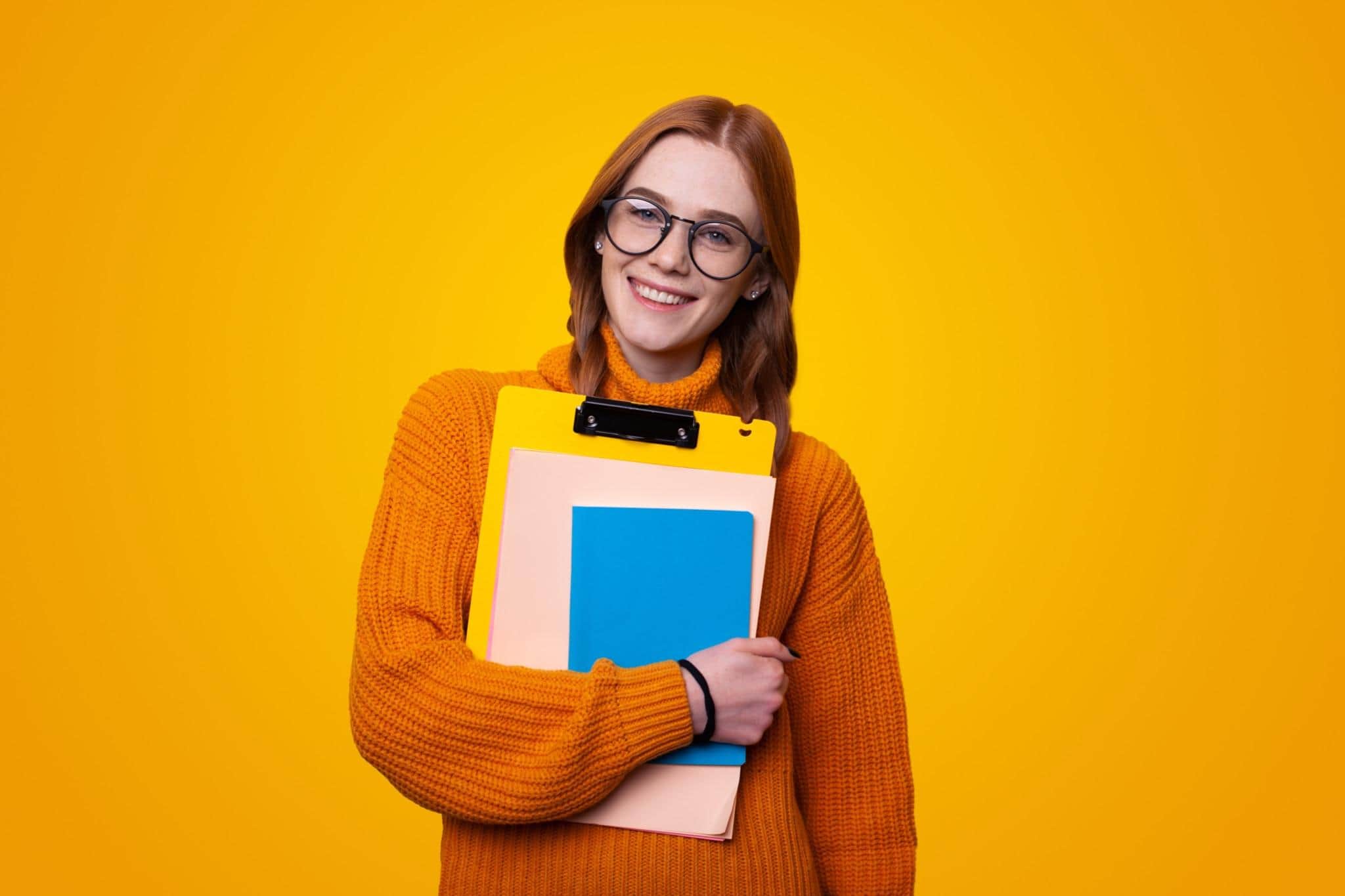 girl holding a notebook