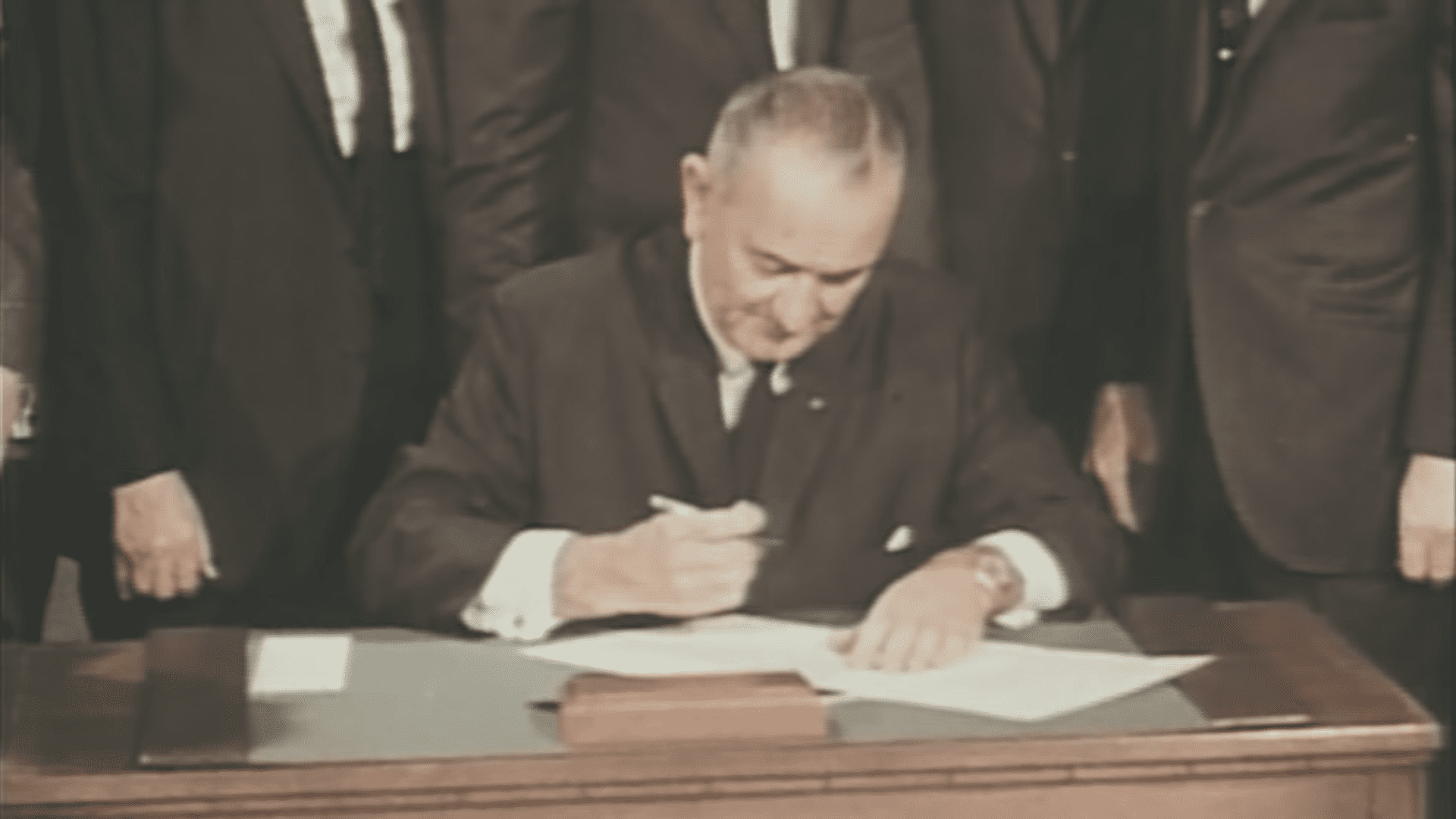 president Lyndon Johnson portrait signing papers