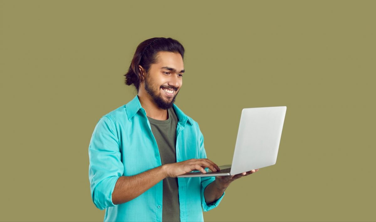 guy holding a laptop