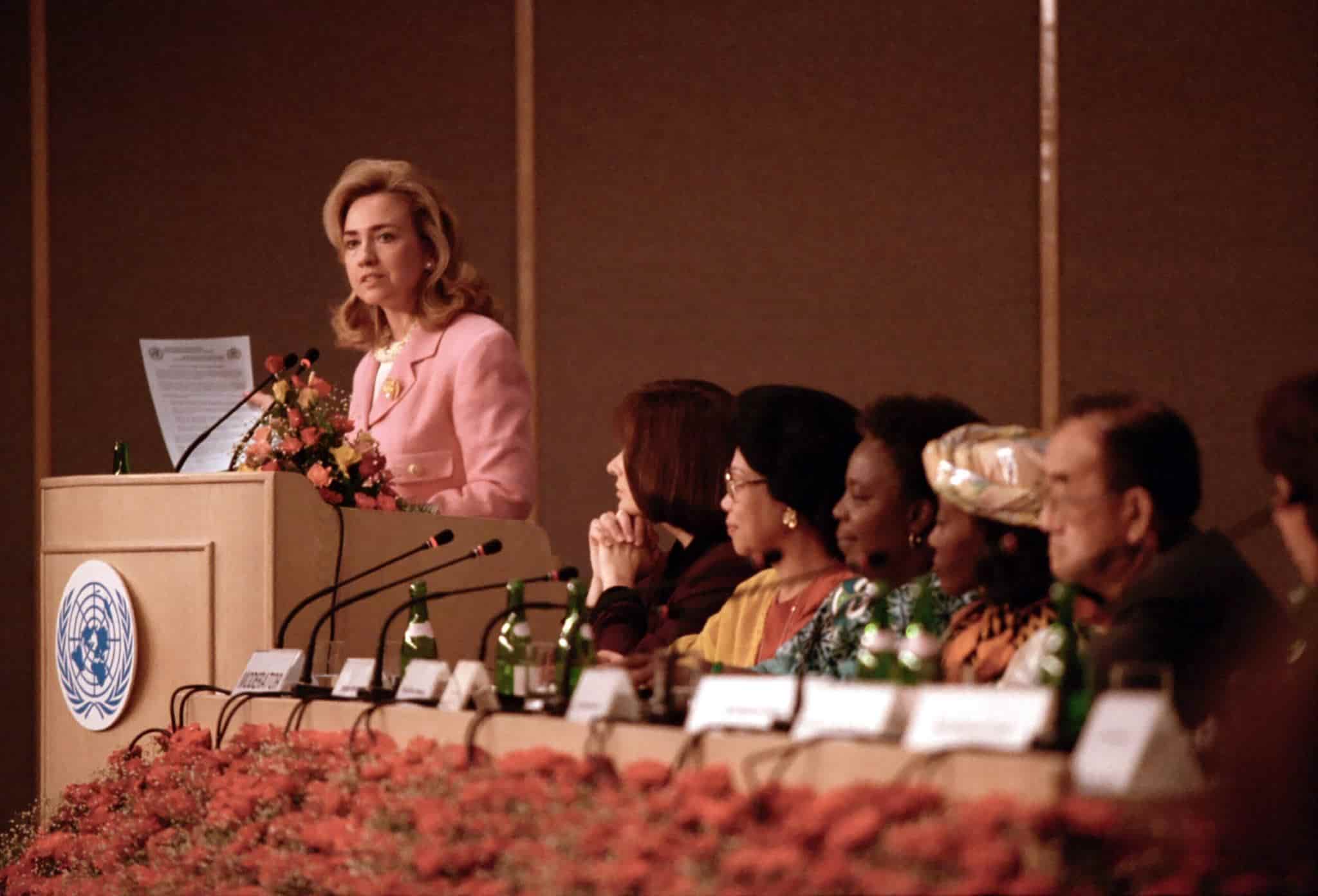 young hilary clinton on a podium