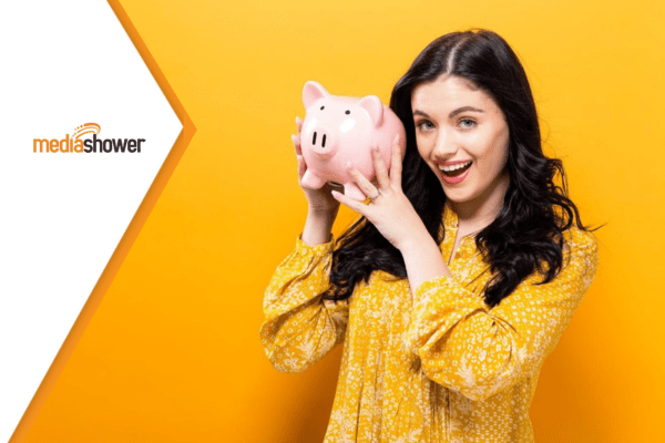 woman holding a piggy bank