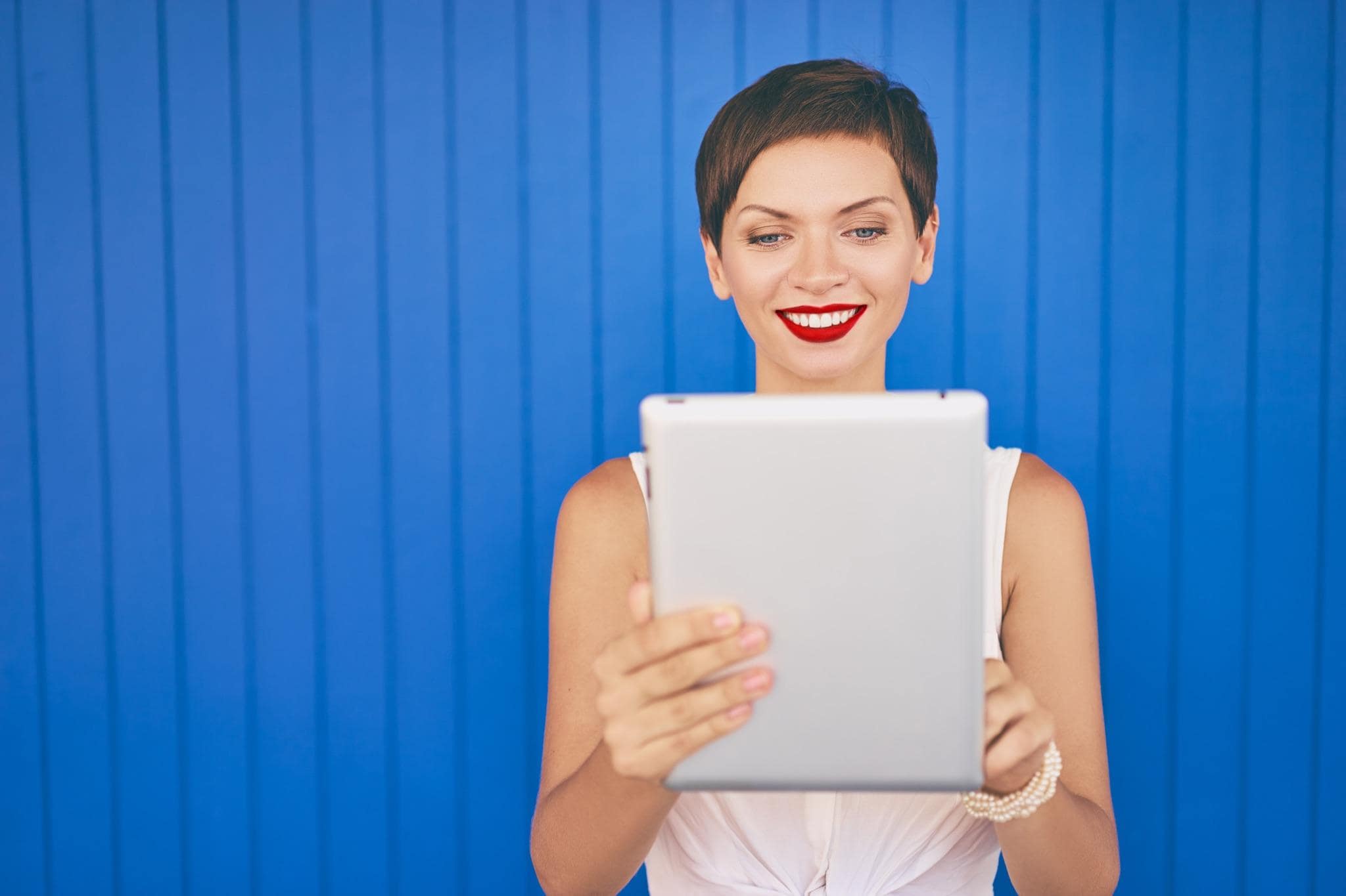 professional woman holding a tablet