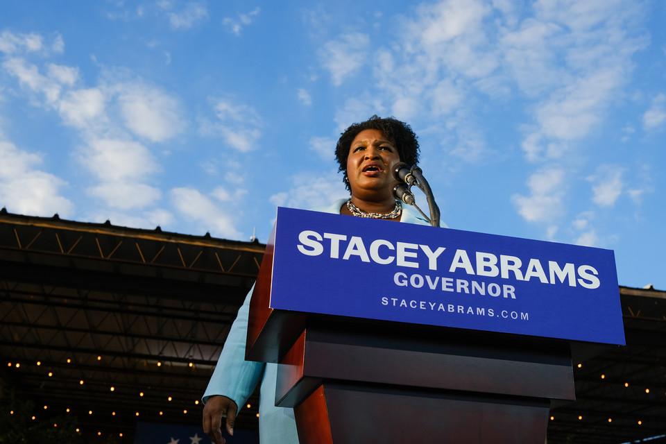 stacey abrams on a podium
