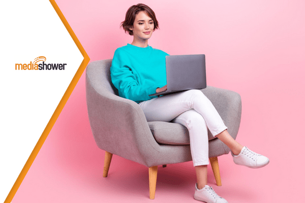 woman sitting and working on her brand guidelines