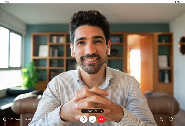 smiling man on a video call preparing for an AI interview