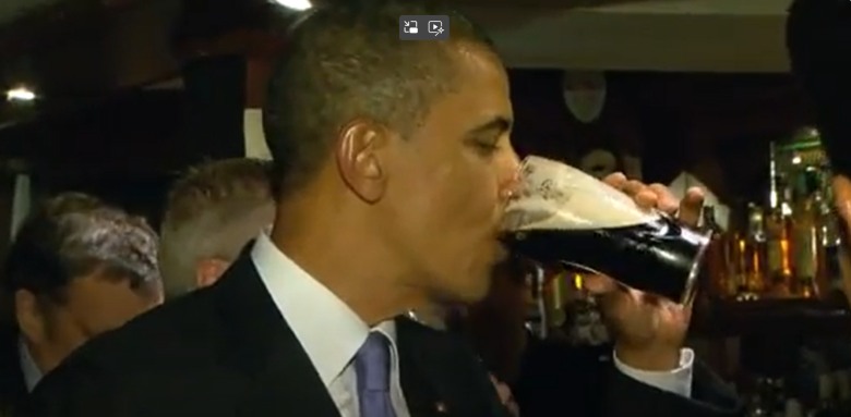 president Obama enjoying a pint of Guinness