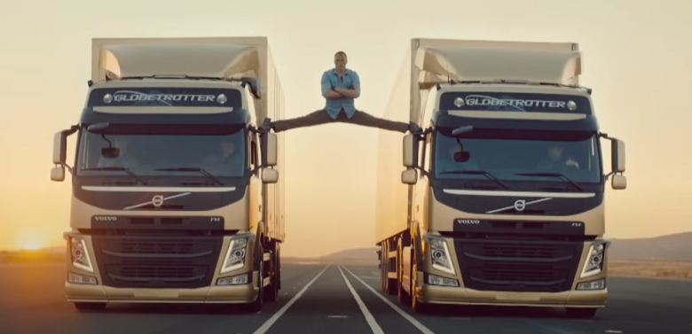 Jean-Claude's split strunt in between two trucks