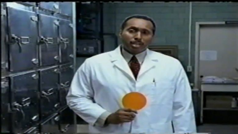 doctor in a white coat at a morgue