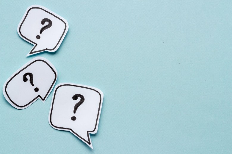 question marks in a light blue background