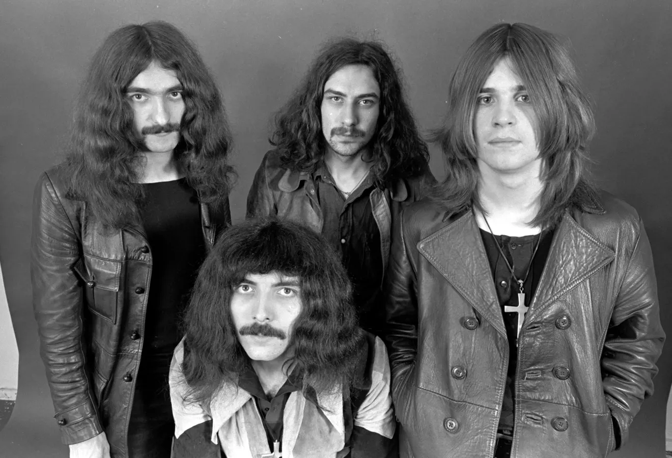 Black Sabbath band members in a classic black and white portrait