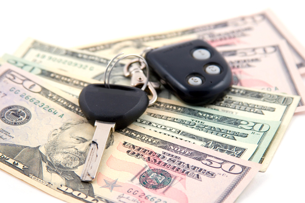 Paper money and set of car keys.