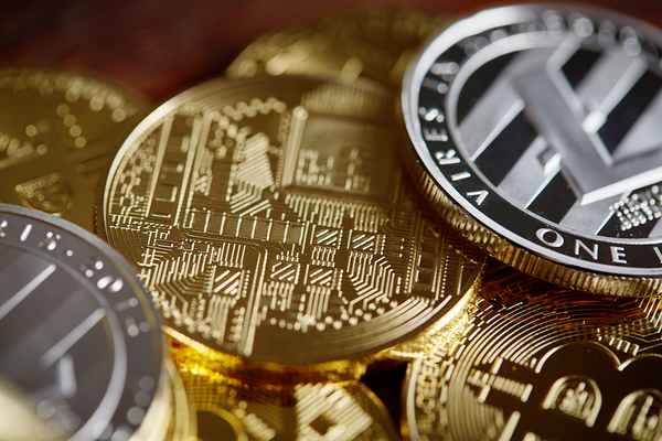 Gold and silver bitcoin coins.