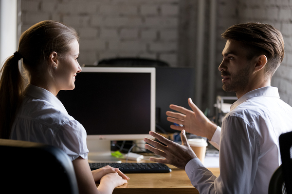 Two colleagues having a discussion.