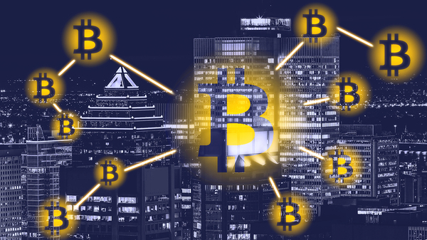 Bitcoin symbols with a city skyline in the background.