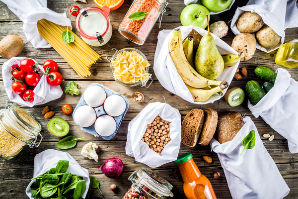 Tabletop filled with food items.