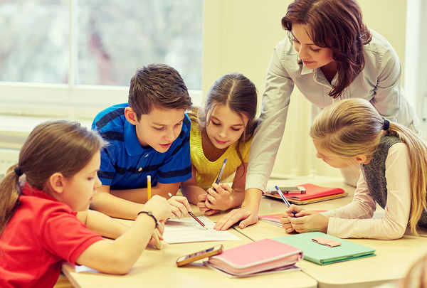 teacher helping student