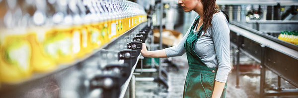 Woman working in a product packaging plant.