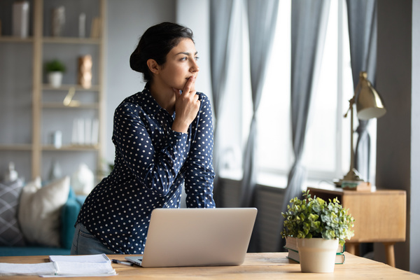 Data Quality - Woman in deep thought.