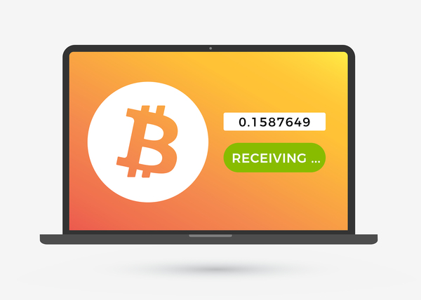Laptop screen displaying the bitcoin symbol and amount receiving.