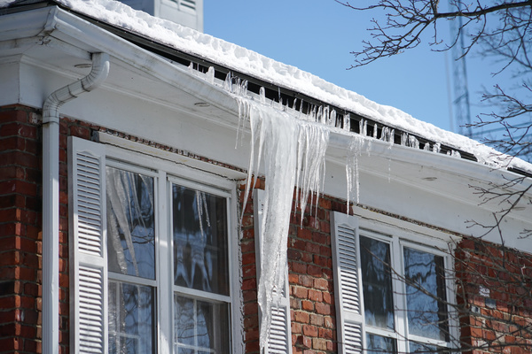 Icicles hanging from a gutter.