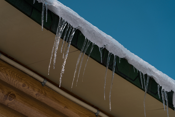 Icicles hanging off gutters.