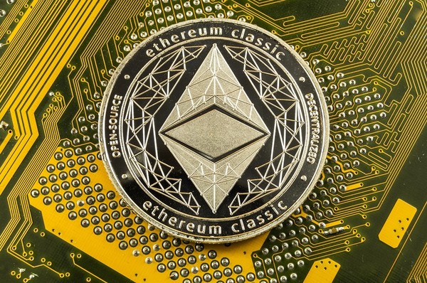 Gold coin with ethereum classic labeling.