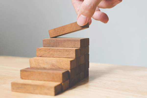 Pile of wooden blocks forming steps.