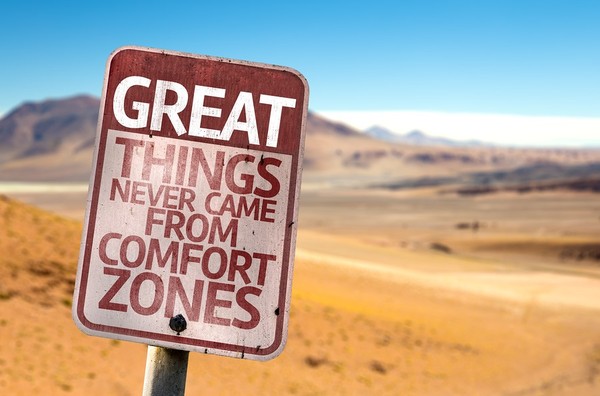 Street sign labeled Great things never came from comfort zones.