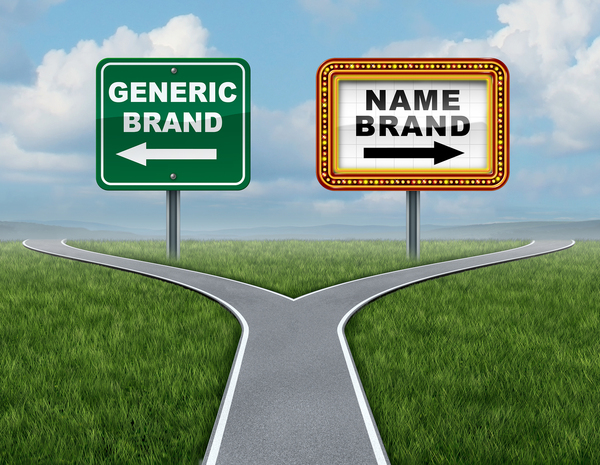 Forked road with two signs pointing in opposite directions Generic Brand and Name Brand.