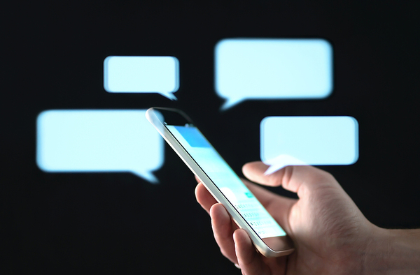Text message bubbles around a phone.