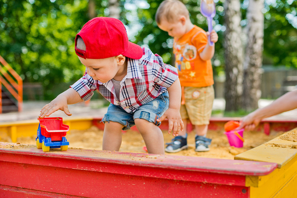 little boys in sandbox