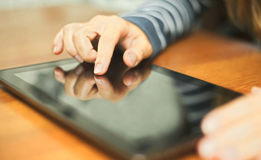 woman using tablet and inbound marketing tools