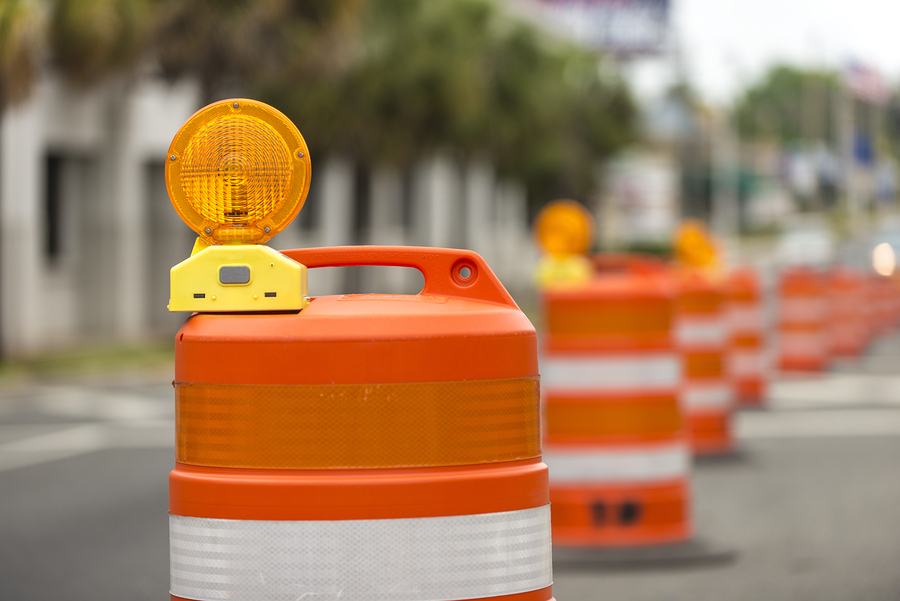 Image of orange construction barrels. Make sure you aren't setting up website design roadblocks.