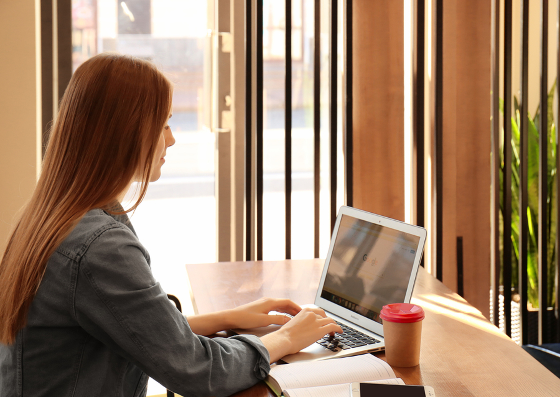 Woman working at her laptop computer. Woman working at her laptop computer.