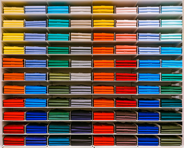 Rows of different colored packages.