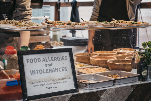 Food shop with a sign labeled Food allergies and intolerances.