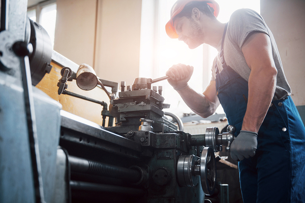 Technician working on machinery.