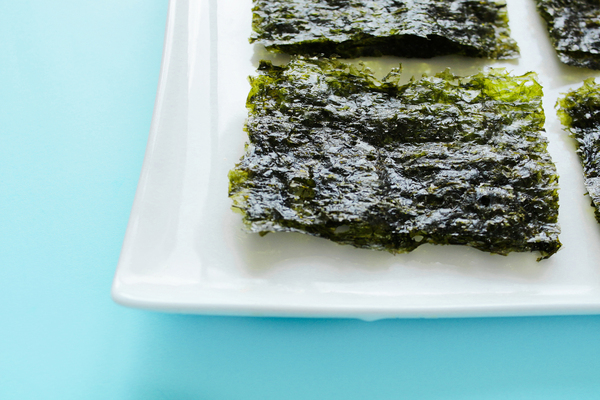 Seaweed on a white plate.