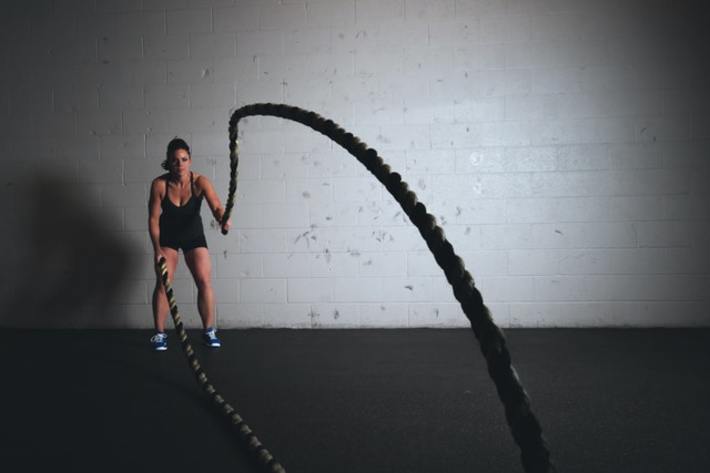 Exercising with ropes.