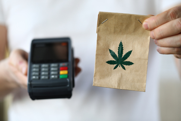 Purchasing cannabis with a credit card.
