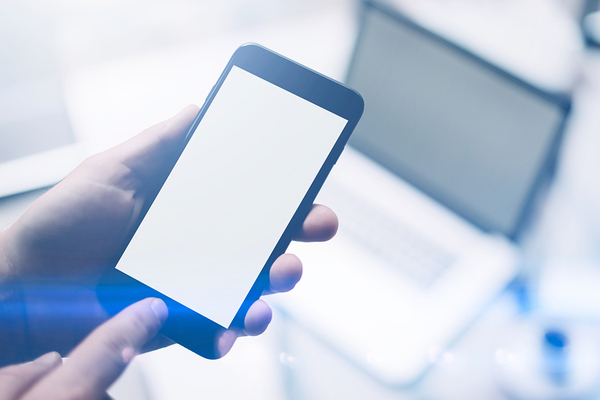 Person looking at their smartphone.