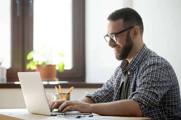 Person working at their laptop.