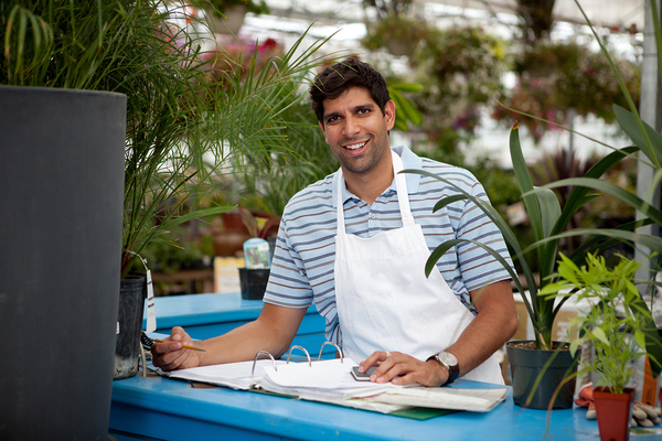 Business owner smiling.