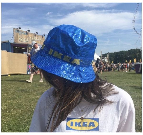 Person wearing an Ikea hat and t shirt.