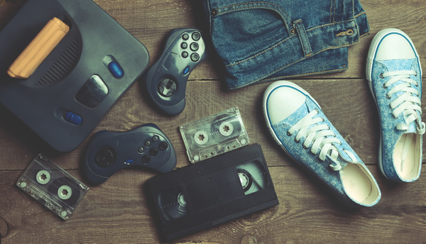 Items from the 80's jeans, sneakers and VHS tape.