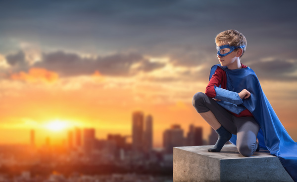boy in a hero costume.