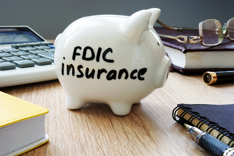 Piggy bank labeled FDIC Insurance.
