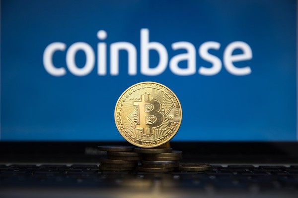 Coinbase with a gold bitcoin coin.