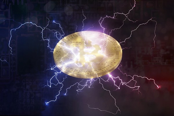 Gold coin with sparks coming out.
