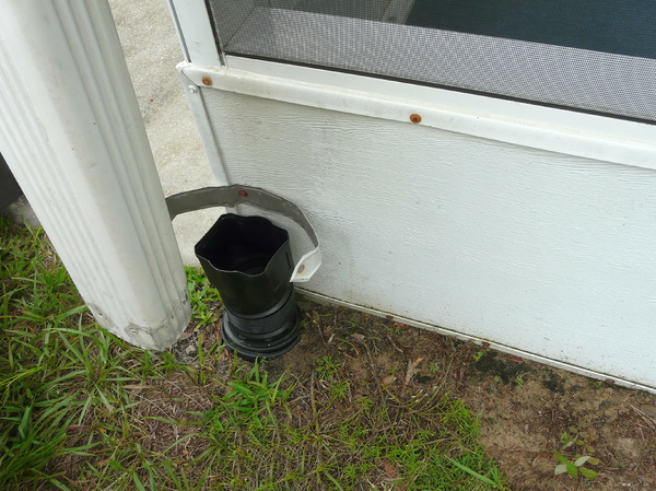 Disconnect downspout from extension.